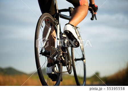 Man cycling road bike in the morning.  55395558