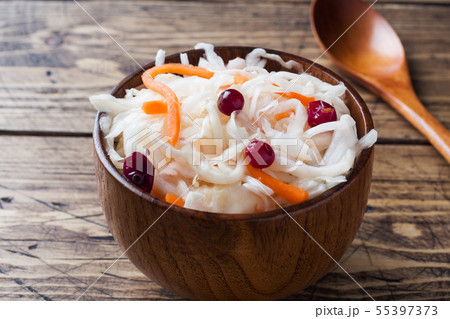 Homemade sauerkraut with carrots and cranberries Homemade sauerkraut with carrots and cranberries 55397373