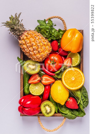 Fruits and vegetables rich in vitamin C in box. Fruits and vegetables rich in vitamin C in box. 55399822