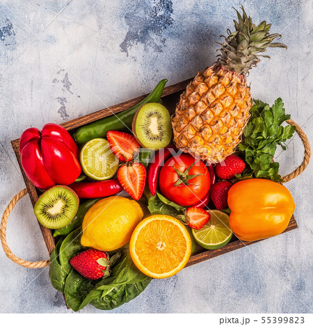 Fruits and vegetables rich in vitamin C in box. 55399823