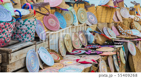 Craft wicker hats, bags and other souvenirs in Morocco market 55409268