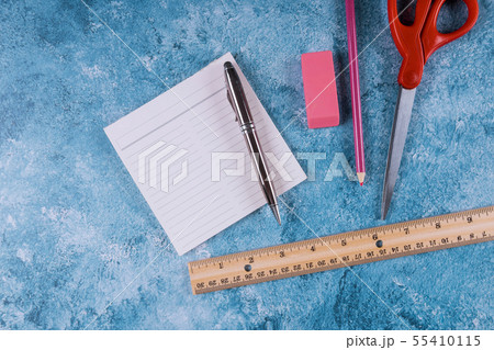 Assortment of school supplies. Ruler, scissors, Assortment of school supplies. Ruler, scissors, 55410115