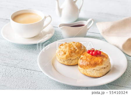 Classic scones with cream and berry jam Classic scones with cream and berry jam 55410324