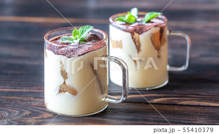 Two glass mugs of tiramisu 55410379