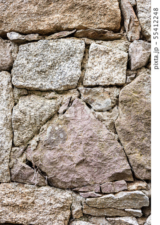 Texture of an irregular stone wall. Background. Texture of an irregular stone wall. Background. 55412248