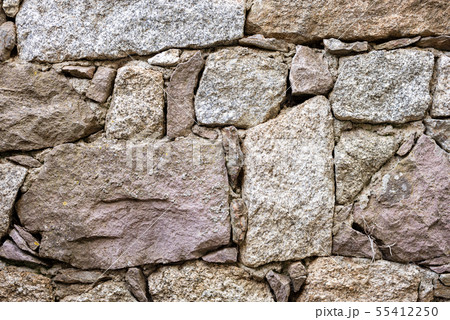 Texture of an irregular stone wall. Background. Texture of an irregular stone wall. Background. 55412250