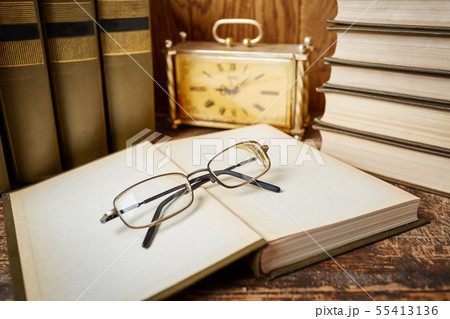 Group of school supplies and books on wooden table 55413136