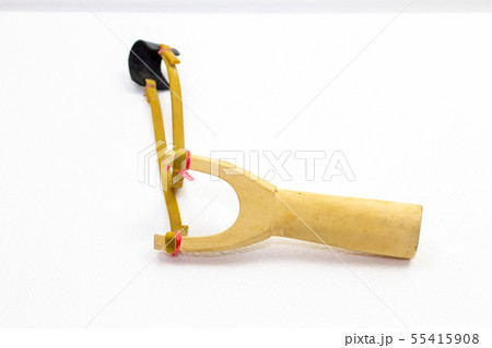Handmade slingshot catapult. Y-shaped wooden stick Handmade slingshot catapult. Y-shaped wooden stick 55415908