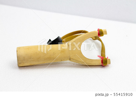Handmade slingshot catapult. Y-shaped wooden stick Handmade slingshot catapult. Y-shaped wooden stick 55415910