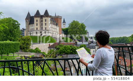 woman visiting castle of Pau city in France 55418804