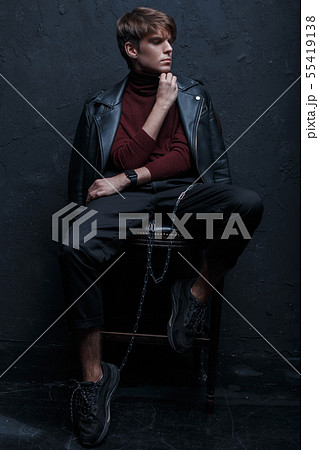 Young charming man with a hairstyle Young charming man with a hairstyle 55419138