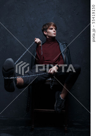 Young man in a vintage jacket Young man in a vintage jacket 55419150