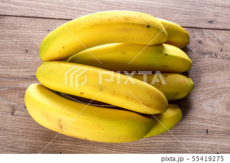 bananas on the wooden table 55419275