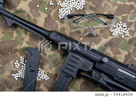air soft machine gun with protective glasses and air soft machine gun with protective glasses and 55419439