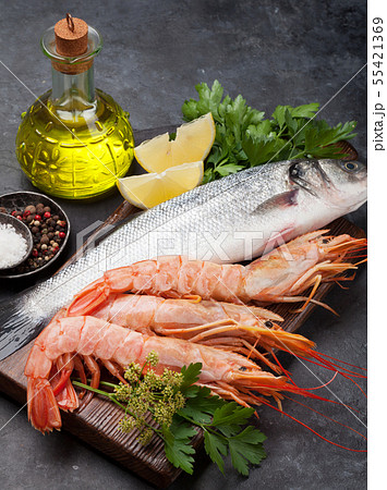 Fresh seafood. Trout fish and langostino shrimps 55421369