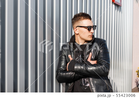 Handsome stylish young hipster man Handsome stylish young hipster man 55423006