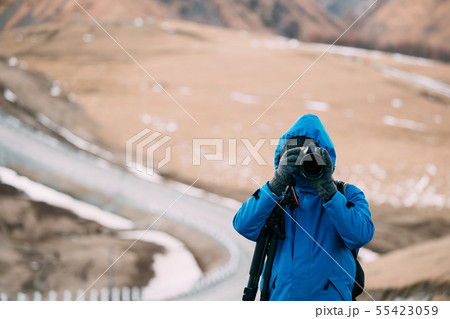 Young Adult Caucasian Man Tourist Backpacker Traveler Photographer Taking Pictures Photos In 55423059