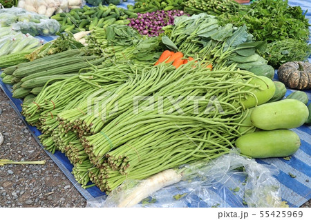 Shops selling vegetables at the market 55425969