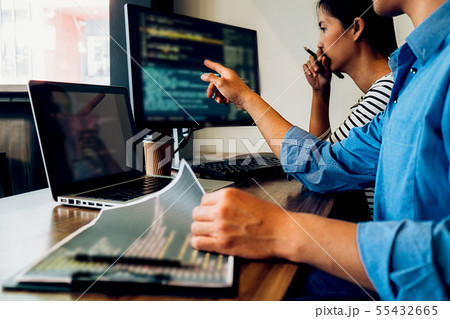 Programmer working in a software development and 55432665