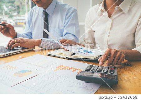 Business advisor analyzing financial figures 55432669