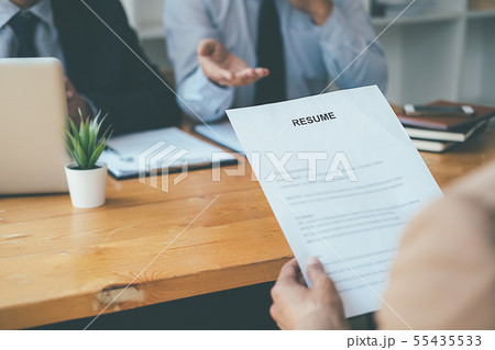 Attractive young business woman in a job interview 55435533