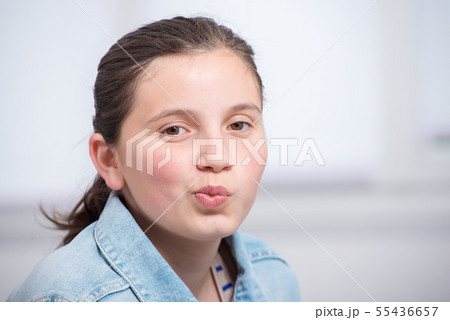 portrait of a smiling teenage girl portrait of a smiling teenage girl 55436657