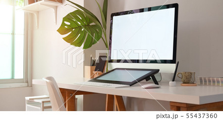 Artist workplace with computer 55437360