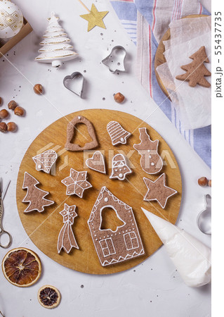 Traditional Christmas gingerbread next to the Traditional Christmas gingerbread next to the 55437735