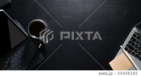 Top view of modern office black leather desk 55438193