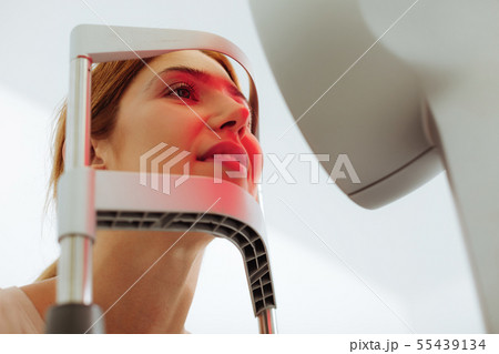 Close up of woman having eye specialist consultation 55439134
