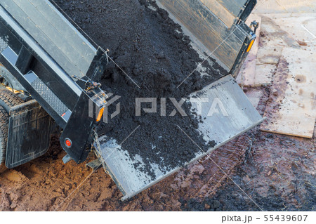 Construction. To unload a truck dump truck 55439607