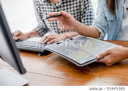 Programmer working in a software development and 55445360