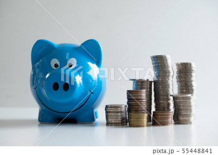 blue piggy with coins pile blue piggy with coins pile 55448841