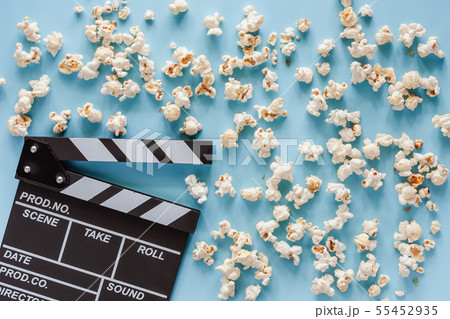 Movie clapper board with popcorn 55452935