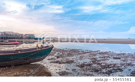 fishing boat docking on the sand bars 55455561
