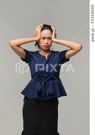 Asian businesswoman standing and akimbo.. 55456609