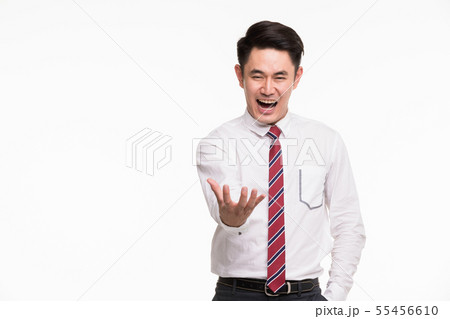 Asian businessman standing and point his hands.. Asian businessman standing and point his hands.. 55456610