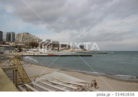 Empty beach of the Black Sea in cloudy autumn Empty beach of the Black Sea in cloudy autumn 55461656