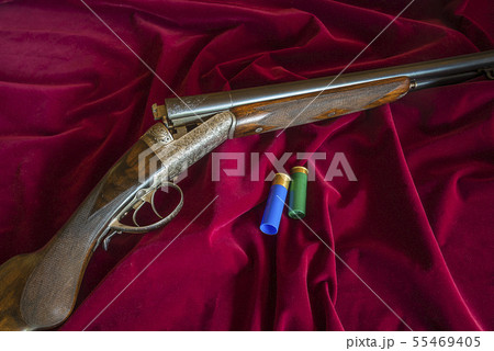 Beautiful hunting rifle on the red velvet Beautiful hunting rifle on the red velvet 55469405