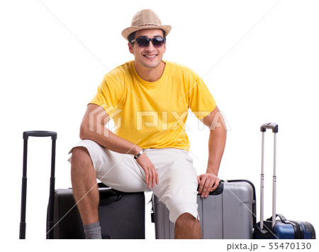 Happy young man going on summer vacation isolated on white Happy young man going on summer vacation isolated on white 55470130