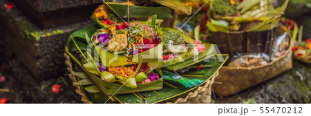 Daily offerings - canang sari is very important in Bali, Indonesia BANNER, LONG FORMAT 55470212