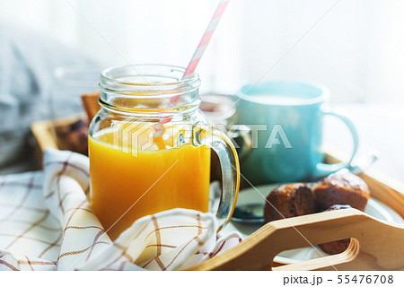 Morning breakfast Orange juice coffee milk muffin Morning breakfast Orange juice coffee milk muffin 55476708