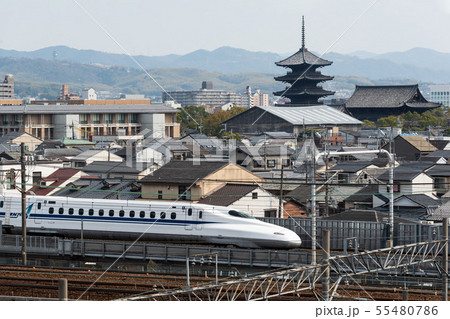 N700 Series Shinkansen with a backdrop of Kyoto N700 Series Shinkansen with a backdrop of Kyoto 55480786
