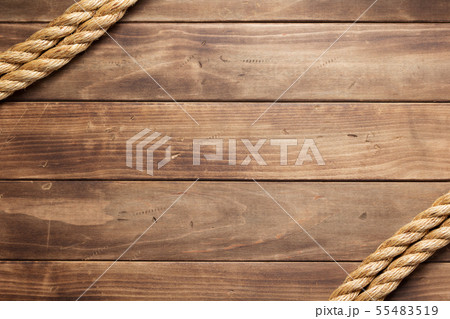 ship rope at wooden background texture 55483519