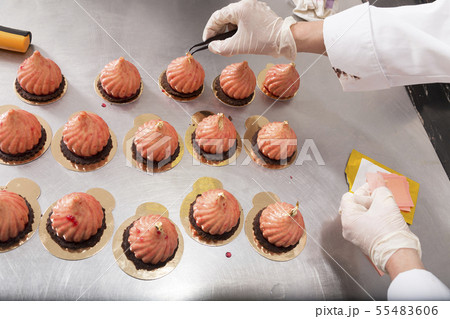 Making mousse cake in the shape of a dome. Making mousse cake in the shape of a dome. 55483606