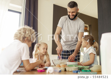Joyful nice father cooking breakfast in the morning Joyful nice father cooking breakfast in the morning 55484521
