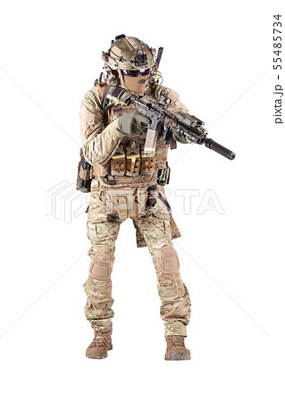 Equipped army soldier aiming rifle studio shoot 55485734