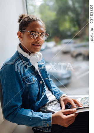 Positive delighted young man enjoying his morning 55485834