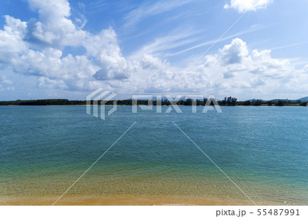 Tropical sea with clear blue sky and white clouds 55487991