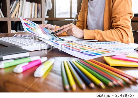 Image of female creative graphic designer working Image of female creative graphic designer working 55489757